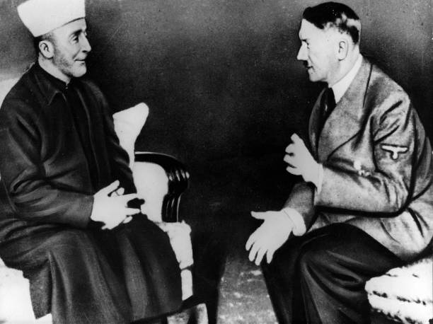Adolf Hitler talking to Grand Mufti Haj Amin el Husseini.
