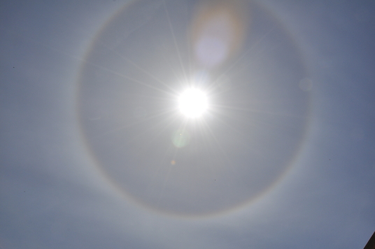 The sun, with halo.